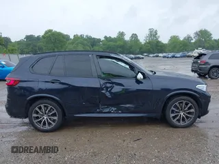 2022 BMW X5 xDrive40i with VIN 5UXCR6C0XN9K22953, listed as a IAAI auction lot 42371776 with 36,912 mi miles and . Bid and sale history available at DreamBid. Image 13.