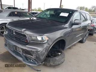 2017 Dodge Durango GT with VIN 1C4RDJDG3HC936794, listed as a IAAI auction lot 41794497 with 131,635 mi miles and . Bid and sale history available at carsss.com. Image 2.
