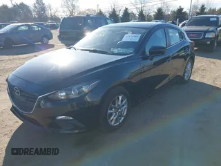 2014 Mazda 3 i Grand Touring with VIN JM1BM1M70E1211906, listed as a IAAI auction lot 41878585 with 112,013 mi miles and . Bid and sale history available at DreamBid. Image 2.