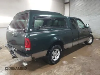 2002 Ford F-150 XL with VIN 1FTRX17L22NB97610, listed as a Copart auction lot 47186355 with 70,767 mi miles and Salvage title. Bid and sale history available at DreamBid. Image 3.