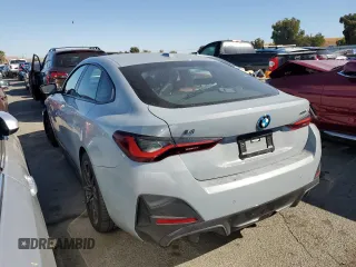 2022 BMW i4 eDrive40 z VIN WBY73AW0XNFN24679, wystawiony jako Copart lot #70213313 z przebiegiem 14 403 mil mil oraz . Historia ofert i sprzedaży dostępna na DreamBid. Obrazek 2.