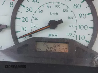 2003 Toyota Corolla CE with VIN JTDBR32E930004139, listed as a IAAI auction lot 42113619 with 209,120 mi miles. Bid and sale history available at carsss.com. Image 7.