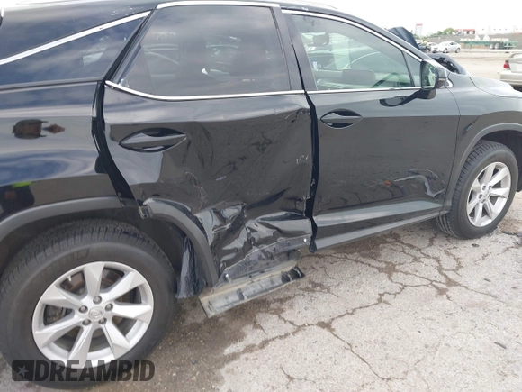 2016 Lexus RX 350 z VIN 2T2BZMCA4GC017342, wystawiony jako IAAI lot #42357093 z przebiegiem 142 515 mil mil oraz . Historia ofert i sprzedaży dostępna na DreamBid. Obrazek 6.