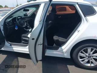 2018 Kia Optima LX z VIN 5XXGT4L32JG213616, wystawiony jako IAAI lot #42408629 z przebiegiem 130 163 mil mil oraz . Historia ofert i sprzedaży dostępna na DreamBid. Obrazek 8.