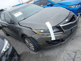 2013 Kia Optima EX z VIN 5XXGN4A7XDG226375, wystawiony jako IAAI lot #42300254 z przebiegiem 236 795 mil mil oraz . Historia ofert i sprzedaży dostępna na DreamBid. Obrazek 1.