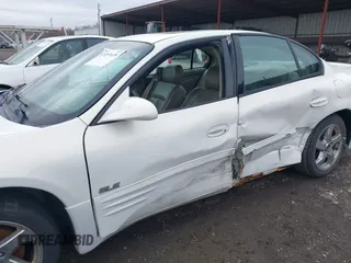 2004 Pontiac Bonneville SLE z VIN 1G2HY52K54U215710, wystawiony jako IAAI lot #41497635 z przebiegiem 123 343 mil mil oraz . Historia ofert i sprzedaży dostępna na DreamBid. Obrazek 6.
