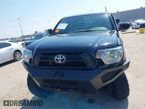 2014 Toyota Tacoma PreRunner with VIN 3TMKU4HN0EM040104, listed as a IAAI auction lot 41619179 with 171,542 mi miles and . Bid and sale history available at DreamBid. Image 12.