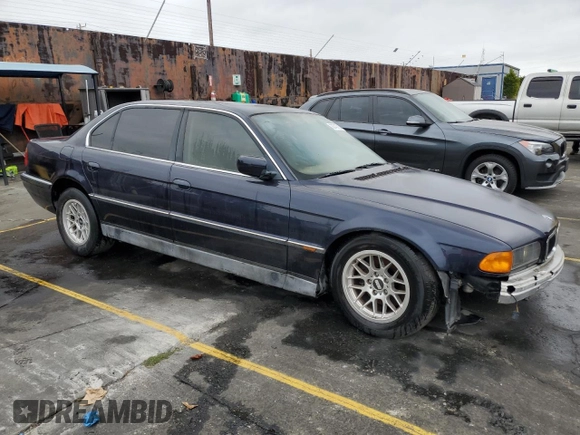 1998 BMW 7 Series 740il with VIN WBAGJ8321WDM23045, listed as a Copart auction lot 87018324 with 43,906 mi miles and Salvage Title. Bid and sale history available at carsss.com. Image 4.