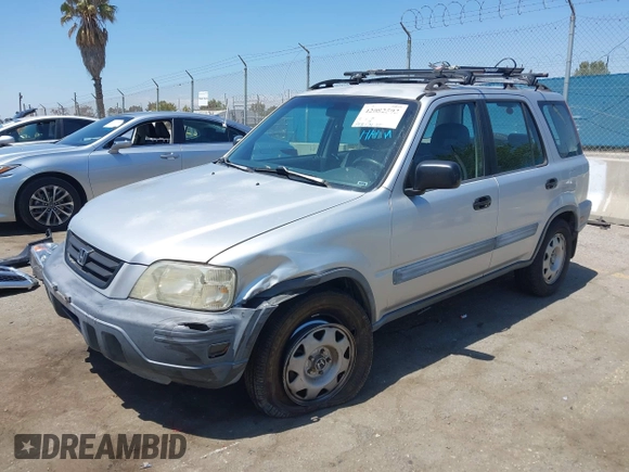 1999 Honda CR-V LX with VIN JHLRD2847XC000944, listed as a IAAI auction lot 42082593 with 198,474 mi miles. Bid and sale history available at carsss.com. Image 2.