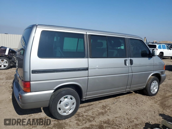 2000 Volkswagen EuroVan с VIN WV2MH4703YH013265, выставлен на аукционе Copart как лот 59003645 с пробегом Не указан миль и Списание • Salvage title. История ставок и продаж доступна на DreamBid. Изображение 3.