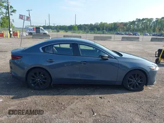 2024 Mazda 3 S Carbon Edition with VIN 3MZBPBCM6RM411828, listed as a IAAI auction lot 42802141 with 40,061 mi miles and . Bid and sale history available at DreamBid. Image 13.