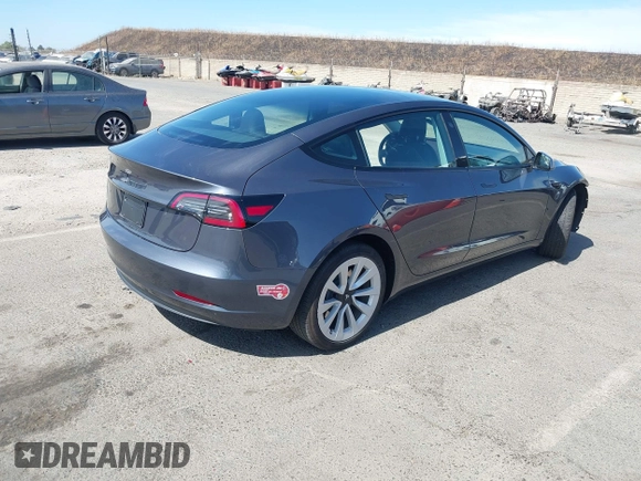 2023 Tesla Model 3 with VIN 5YJ3E1EAXPF652089, listed as a IAAI auction lot 42666520 with 17,679 mi miles and . Bid and sale history available at DreamBid. Image 4.