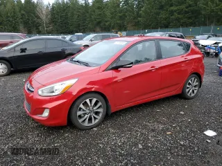 2015 Hyundai Accent Sport with VIN KMHCU5AEXFU205024, listed as a Copart auction lot 87318654 with 113,198 mi miles and Clean Title. Bid and sale history available at carsss.com. Image 1.