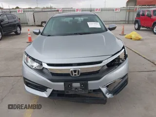 2016 Honda Civic Sedan LX with VIN 19XFC2F54GE068660, listed as a IAAI auction lot 41879984 with 34,144 mi miles. Bid and sale history available at carsss.com. Image 13.