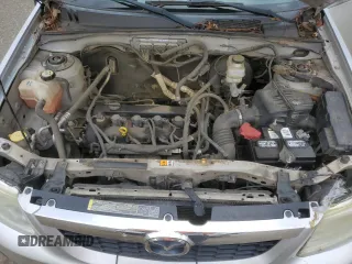 2011 Mazda Tribute Touring with VIN 4F2CY0C70BKM06723, listed as a Copart auction lot 80783624 with 218,372 mi miles and Salvage Title. Bid and sale history available at carsss.com. Image 12.
