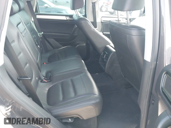 2011 Volkswagen Touareg Sport with VIN WVGFF9BP3BD002517, listed as a IAAI auction lot 42174143 with 156,337 mi miles and . Bid and sale history available at DreamBid. Image 8.