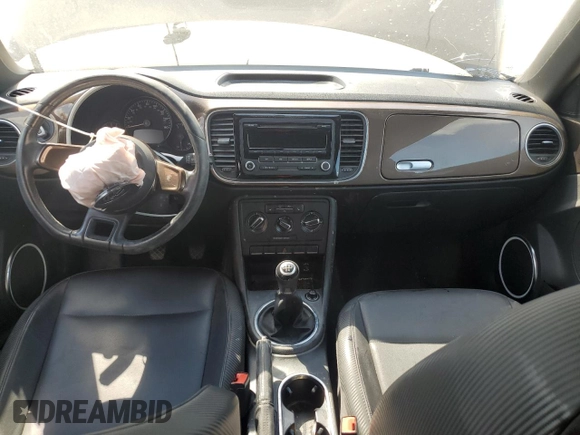 2012 Volkswagen Beetle 2.5L with VIN 3VWHX7AT2CM616099, listed as a Copart auction lot 56421455 with 225,279 mi miles and Salvage title. Bid and sale history available at DreamBid. Image 8.