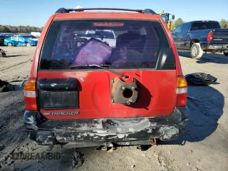 2002 Chevrolet Tracker z VIN 2CNBE13C126918772, wystawiony jako Copart lot #42343685 z przebiegiem Nie podano mil oraz Szkoda całkowita • Salvage title. Historia ofert i sprzedaży dostępna na DreamBid. Obrazek 6.