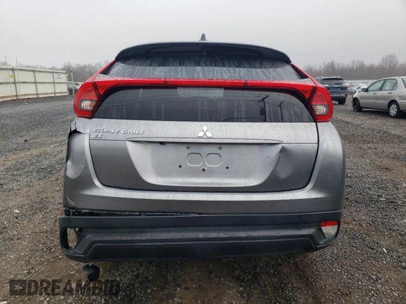 2020 Mitsubishi Eclipse Cross ES z VIN JA4AS3AAXLZ017311, wystawiony jako Copart lot #49521925 z przebiegiem 52 687 mil mil oraz Szkoda całkowita • Salvage title. Historia ofert i sprzedaży dostępna na DreamBid. Obrazek 6.