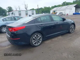 2014 Kia Optima SX Turbo with VIN 5XXGR4A61EG294366, listed as a IAAI auction lot 42540516 with 195,335 mi miles and . Bid and sale history available at DreamBid. Image 4.