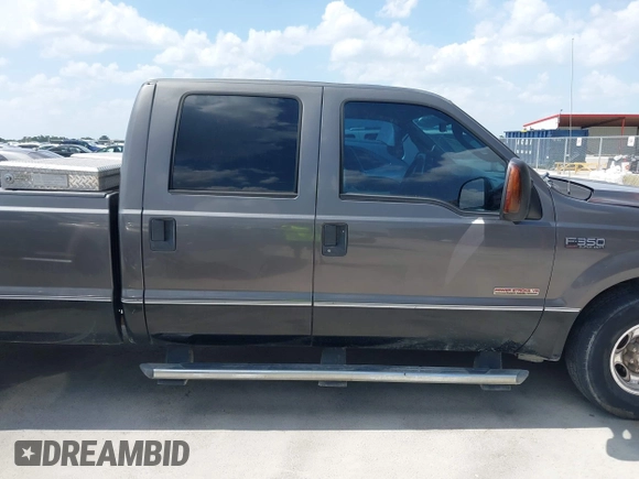 2004 Ford F-350 with VIN 1FTSW30P34EB82548, listed as a IAAI auction lot 42563477 with 186,941 mi miles and . Bid and sale history available at DreamBid. Image 14.
