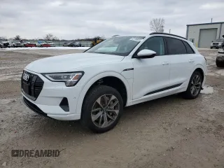2021 Audi e-tron Premium Plus with VIN WA1LAAGE4MB003487, listed as a Copart auction lot 82790024 with 28,165 mi miles and Salvage Title. Bid and sale history available at carsss.com. Image 1.