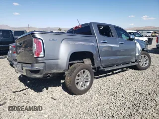 2020 GMC Canyon 4WD SLT with VIN 1GTG6DEN2L1248645, listed as a Copart auction lot 74919454 with 56,085 mi miles and Salvage Title. Bid and sale history available at carsss.com. Image 3.