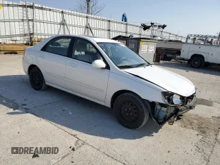2009 Kia Spectra EX with VIN KNAFE221295654167, listed as a Copart auction lot 53377745 with 131,266 mi miles and Salvage Title. Bid and sale history available at DreamBid. Image 4.