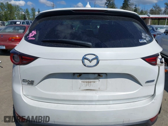 2017 Mazda CX-5 Grand Touring with VIN JM3KFBDL9H0163031, listed as a IAAI auction lot 42098819 with 81,781 mi miles. Bid and sale history available at carsss.com. Image 17.
