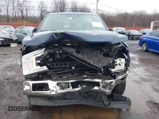 2019 Ford F-150 XL with VIN 1FTEW1EB3KFB10433, listed as a IAAI auction lot 41520139 with 104,405 mi miles and . Bid and sale history available at DreamBid. Image 12.