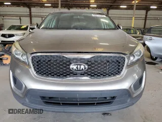 2017 Kia Sorento LX z VIN 5XYPG4A39HG273082, wystawiony jako Copart lot #60574165 z przebiegiem 169 808 mil mil oraz Czysty tytuł • Clean title. Historia ofert i sprzedaży dostępna na DreamBid. Obrazek 5.