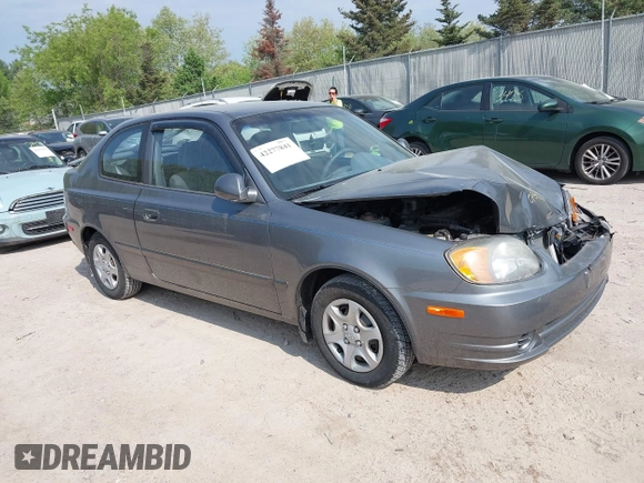 2003 Hyundai Accent GL z VIN KMHCG35CX3U243322, wystawiony jako IAAI lot #42277841 z przebiegiem 45 855 mil mil oraz . Historia ofert i sprzedaży dostępna na DreamBid. Obrazek 1.