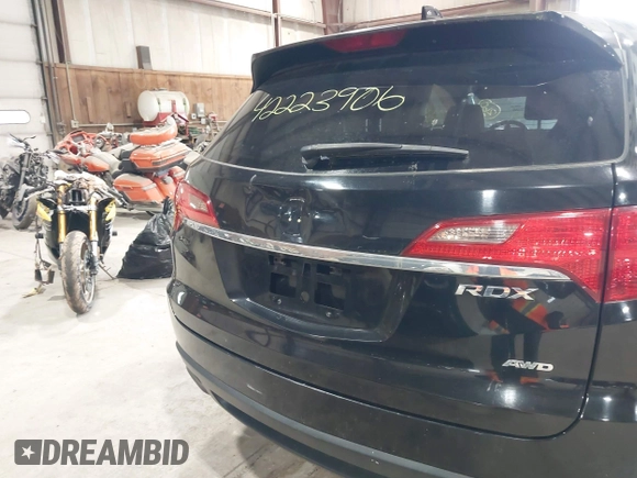 2013 Acura RDX with VIN 5J8TB4H33DL019452, listed as a IAAI auction lot 42223906 with 209,754 mi miles and . Bid and sale history available at carsss.com. Image 6.