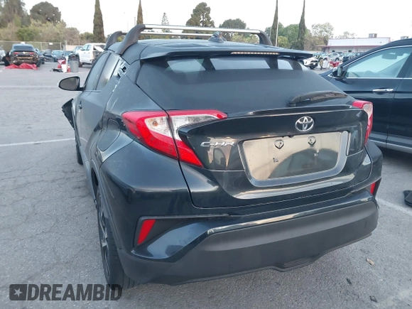 2019 Toyota C-HR XLE with VIN JTNKHMBXXK1034717, listed as a IAAI auction lot 41939078 with 56,309 mi miles. Bid and sale history available at carsss.com. Image 3.