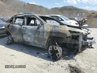 2018 Jeep Cherokee Trailhawk with VIN 1C4PJMBX9JD503209, listed as a Copart auction lot 49323265 with Not provided miles and Salvage title. Bid and sale history available at DreamBid. Image 4.