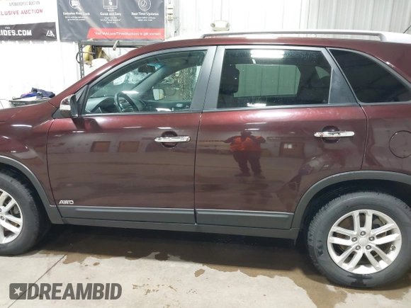 2015 Kia Sorento LX with VIN 5XYKTDA70FG646886, listed as a IAAI auction lot 42469491 with 214,232 mi miles and . Bid and sale history available at DreamBid. Image 14.