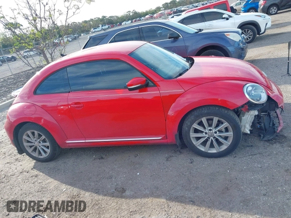 2018 Volkswagen Beetle S z VIN 3VWFD7AT5JM725878, wystawiony jako IAAI lot #41743855 z przebiegiem 108 068 mil mil oraz . Historia ofert i sprzedaży dostępna na DreamBid. Obrazek 13.