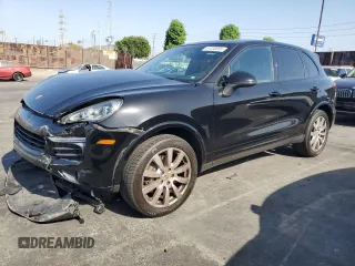 2017 Porsche Cayenne with VIN WP1AA2A20HKA80640, listed as a Copart auction lot 61038585 with 60,893 mi miles and Salvage title. Bid and sale history available at DreamBid. Image 1.