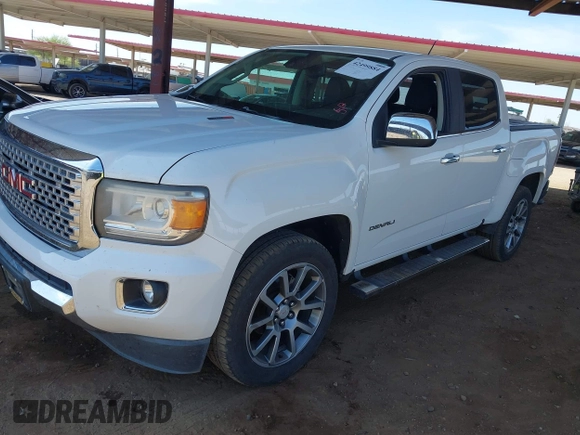 2018 GMC Canyon 4WD Denali z VIN 1GTP6EE11J1178961, wystawiony jako IAAI lot #42499884 z przebiegiem 71 309 mil mil oraz . Historia ofert i sprzedaży dostępna na DreamBid. Obrazek 17.