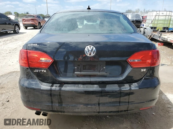 2014 Volkswagen Jetta SE with VIN 3VWD07AJ7EM293656, listed as a Copart auction lot 55077455 with 82,160 mi miles and Salvage title. Bid and sale history available at DreamBid. Image 6.