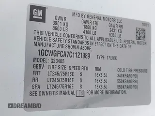 2012 Chevrolet Express Cargo Van with VIN 1GCWGFCA7C1121989, listed as a IAAI auction lot 42118853 with 214,478 mi miles. Bid and sale history available at carsss.com. Image 9.