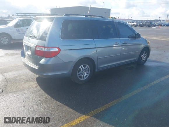 2006 Honda Odyssey EX-L with VIN 5FNRL386X6B018587, listed as a IAAI auction lot 41725966 with 168,215 mi miles. Bid and sale history available at carsss.com. Image 4.