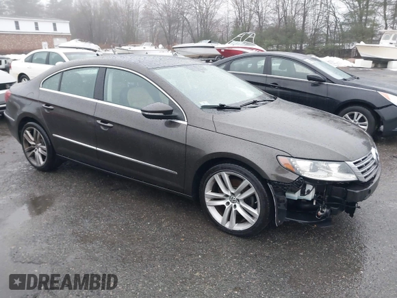 2013 Volkswagen CC Lux with VIN WVWRP7AN5DE554388, listed as a IAAI auction lot 41004116 with 162,457 mi miles. Bid and sale history available at carsss.com. Image 1.
