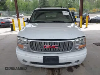 2004 GMC Yukon Denali z VIN 1GKEK63U84J148225, wystawiony jako IAAI lot #42218451 z przebiegiem 296 149 mil mil oraz . Historia ofert i sprzedaży dostępna na DreamBid. Obrazek 12.