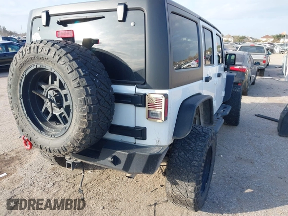 2017 Jeep Wrangler Unlimited Sport with VIN 1C4HJWDG1HL580136, listed as a IAAI auction lot 41193905 with 63,875 mi miles. Bid and sale history available at carsss.com. Image 4.