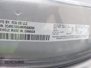 2021 Chrysler Voyager LXi z VIN 2C4RC1DG4MR568260, wystawiony jako IAAI lot #42187861 z przebiegiem Nie podano mil oraz . Historia ofert i sprzedaży dostępna na DreamBid. Obrazek 9.