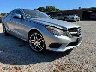 2015 Mercedes-Benz E-Class E 400 with VIN WDDKJ6FB2FF307294, listed as a Copart auction lot 77882794 with 82,173 mi miles and Salvage Title. Bid and sale history available at carsss.com. Image 1.