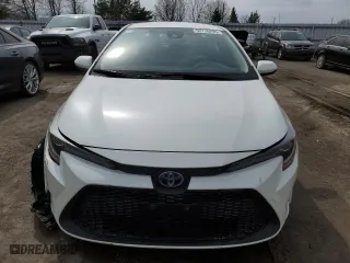 2021 Toyota Corolla Hybrid with VIN JTDBAMDE2MJ021418, listed as a Copart auction lot 52736295 with 92,061 mi miles and Salvage Title. Bid and sale history available at carsss.com. Image 5.