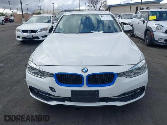 2017 BMW 3 Series 330e iPerformance with VIN WBA8E1C51HK895223, listed as a IAAI auction lot 41492625 with 116,486 mi miles. Bid and sale history available at carsss.com. Image 12.