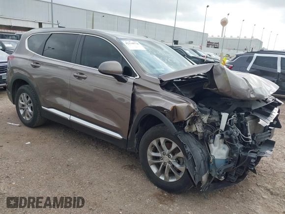 2019 Hyundai Santa Fe SE z VIN 5NMS23AD2KH014037, wystawiony jako IAAI lot #42110778 z przebiegiem 48 975 mil mil oraz . Historia ofert i sprzedaży dostępna na DreamBid. Obrazek 1.